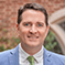 headshot of John F. Preis